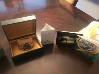 World traveling 2005 Rolex submariner blue dial SS & 18 ct in 6