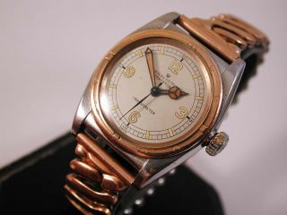2 - Tone Ss & Rose Gold Rolex Oyster Perpetual Bubbleback.  Ref: 3372.  Running.