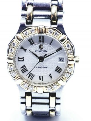 Ladies Concord " Saratoga " 18k And Stainless Steel With Diamond Bezel Accents.