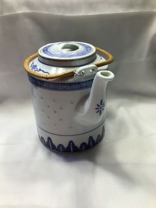 Chinese Rice Grain Porcelain Teapot With Bamboo Handles Blue And White