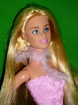Barbie Doll With Long Blonde Hair And Pink Rosebud Moulded Bodysuit