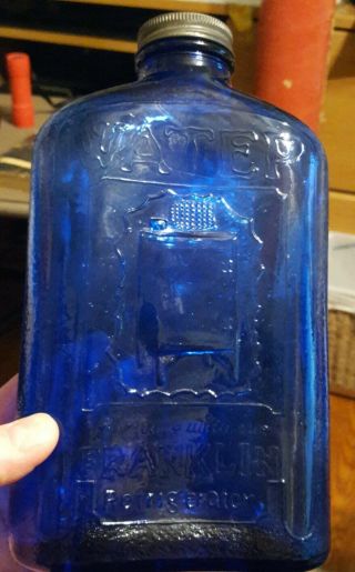 Vintage Cobalt Blue Glass Franklin Refridgerator Water Bottle Embossed
