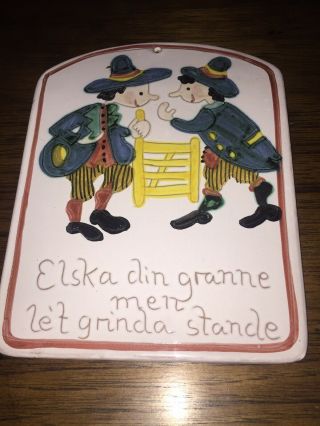 Norwegian Clay Trivet Cheese Board? 2 Men At Fence Post Glazed Plaque Norway
