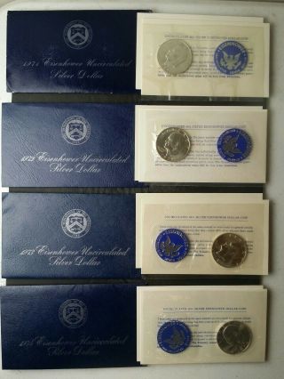 1971,  1972,  1973,  And 1974 $1 Eisenhower Uncirculated Silver Dollars