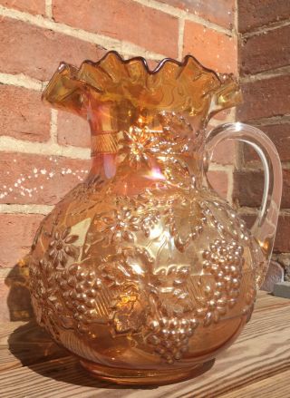 Carnival Glass Dugan Marigold Floral And Grape Ruffled Edge Water Pitcher
