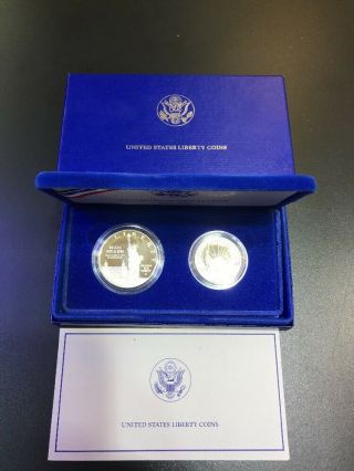 1886 - 1986 United States Liberty Coins Silver Dollar Half Dollar Set Ellis Island