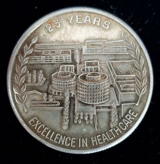 1 Troy Oz.  999 Fine Silver Bu 25 Years Of Excellence In Healthcare Bullion Coin.