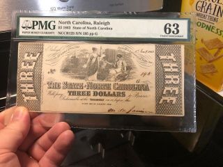 1863 RALEIGH,  NC $3 STATE OF NORTH CAROLINA OBSOLETE NOTE PMG CHOICE UNC 63 5