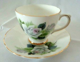 Royal Staffordshire England Bone China Blue Tea Cup And Saucer With White Roses