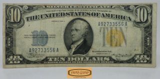 1934 - A $10 Yellow Seal North Africa Silver Certificate Fr 2309,  Tear - B19844
