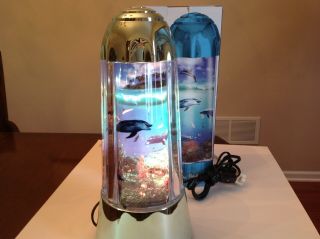 Rotating Dolphin Aquarium Lamp.  By Rabbit Tanaka.  Spencer Gifts 1994