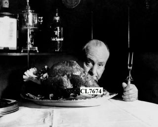 Alfred Hitchcock With A Turkey At The 21 Club In York City Photo