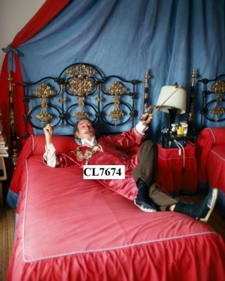 Salvador Dali On A Bed In The Bedroom Of His House Near Cadaques In Spain Photo