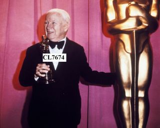 Charlie Chaplin Holding His Honorary Oscar At The 44th Academy Awards Photo