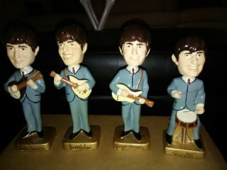 The Beatles 1964 Car Mascots Bobble Head Dolls