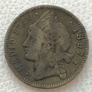 1897 A Dominican Republic Silver 1/2 Medio Peso Lamination Error Coin