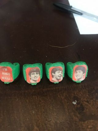 Set Of 4 Plastic Beatles Flicker Rings 1960s