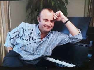 Photo Signed By Phil Collins 12x8 With