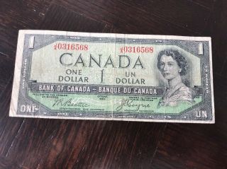 1954 $1 Devils Face Canadian Note Bill Authentic