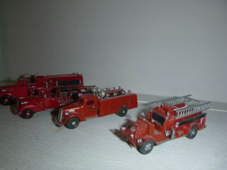 4 Vintage Ho Fire Trucks,  1920 