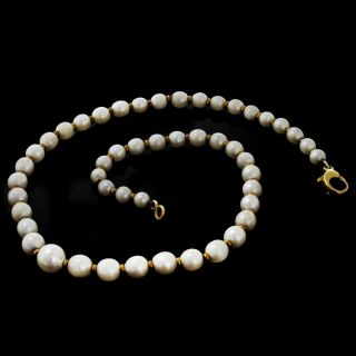 Vintage Graduated Pearl And 14 Karat Yellow Gold Necklace.