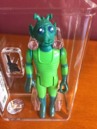 Vintage Star Wars.  Afa 85 Greedo.  Bright Green And Lines.  Colors Pop.