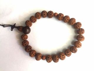 Intricately Carved Vintage Chinese Seed Beads With Buddhist Monks
