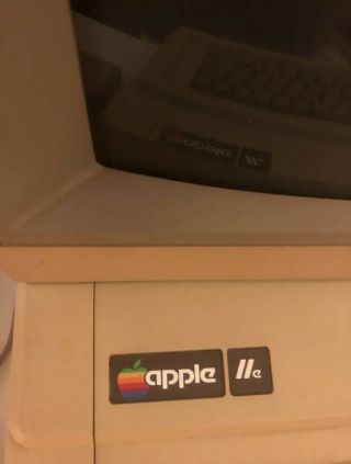 vintage Apple IIe with monitor,  disk drive,  software,  and peripherals 3