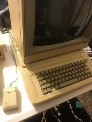 vintage Apple IIe with monitor,  disk drive,  software,  and peripherals 4