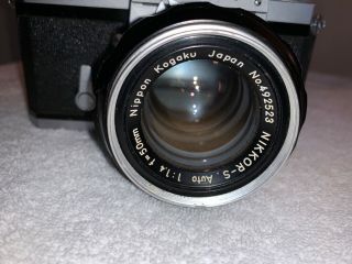 Nikon F,  serial 6531479,  vintage camera with 50mm lens,  eye level prism plus 1 2