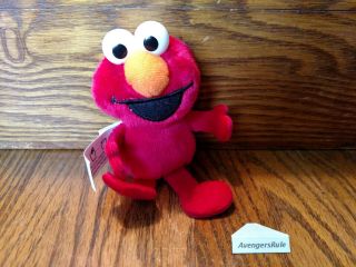 Sesame Street 50 Years And Counting Surprise Plush Elmo