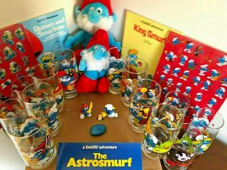 13 Smurf 6 " Tall Glasses,  3 Smurf Books,  4 Pages Of Smurf Stickers,  2 Stuffed