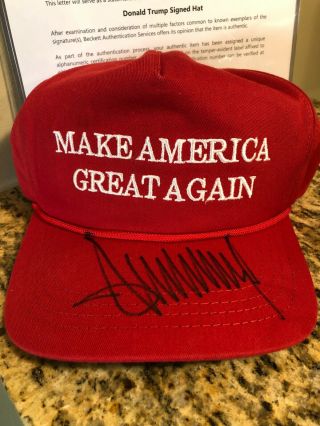 President Donald Trump Signed Official Red Maga Hat Autograph Beckett Bas