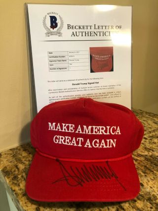 PRESIDENT DONALD TRUMP SIGNED OFFICIAL RED MAGA HAT AUTOGRAPH BECKETT BAS 2