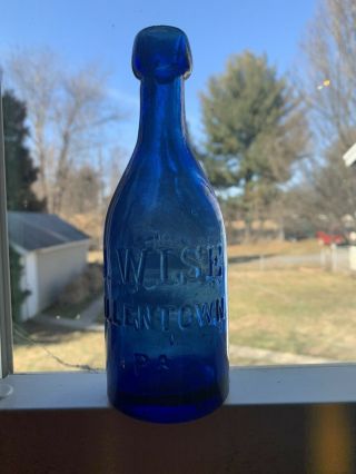 J.  Wise Allentown,  Pa.  Blue Soda/beer Bottle