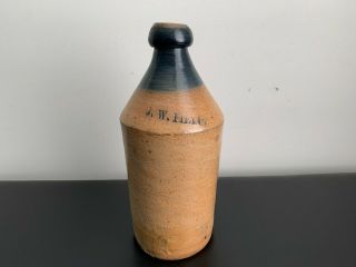 Antique J.  W.  Pierce Stoneware Beer Bottle With Blue Top