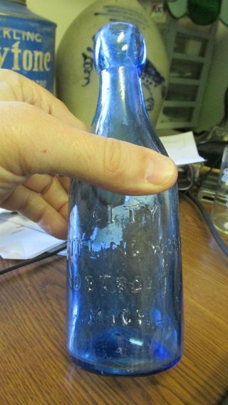 Detroit,  Mich.  G.  Norris & Co.  City Bottling Cobalt Blue Squat Soda Bottle