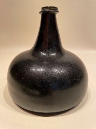 18th Century English Black Glass Onion Wine Bottle Circa 1700