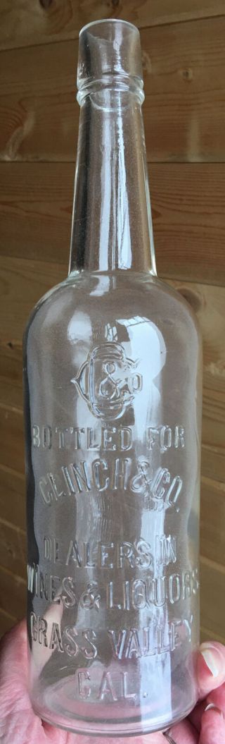 Early Grass Valley,  Ca.  Clinch And Co.  Embossed Whiskey Bottle