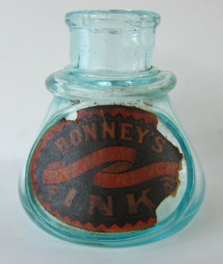 W.  E.  Bonney Premium French Ink Embossed Aqua Cone Bottle - Paper Label