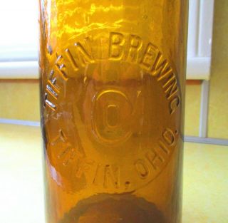 Tiffin Brewing Co.  - Tiffin,  Ohio Embossed Quart Amber Blob Top Beer Bottle