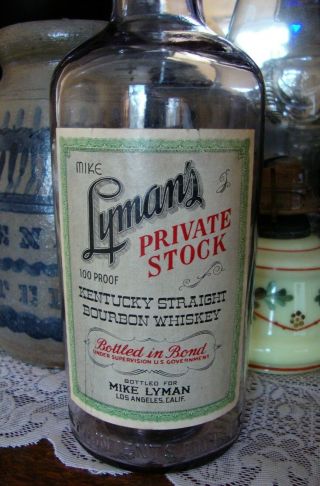 Labeled MIKE LYMAN ' S PRIVATE STOCK WESTERN WHISKEY BOTTLE LOS ANGELES CALIFORNIA 2