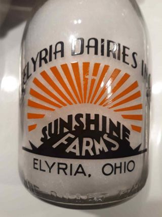 Elyria,  Ohio,  Elyria Dairies Inc.  " Sunshine Farms,  " Qt.  Milk Bottle