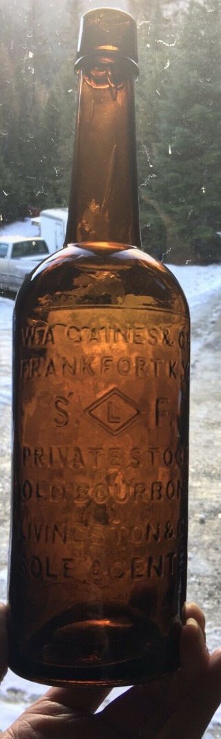 Early Frankfort,  Kentucky W.  A.  Gaines And Co.  Amber Embossed Whiskey Bottle