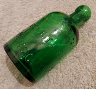 Mega Rare Martins Vegetable Embrocation Emerald Green Dumpy Seltzer Bottle.