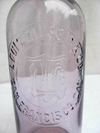 Antique Whiskey Bottle.  Louis Taussic & Co.  San Franciso.  Screw Top.  Purple