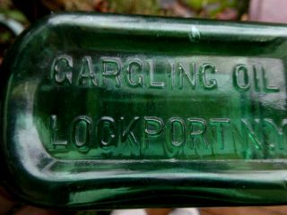 Teal Green Gargling Oil Lockport N.  Y.  5 3/4 Inches