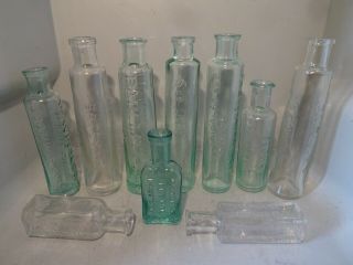Group Of Embossed Cylinder Medicine Bottles