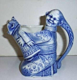 Schafer Vater Blue German Porcelain Creamer - Chinaman Holding Crying Baby
