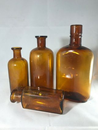 Vintage Amber Bottles From The Late 1800s To Early 1900s